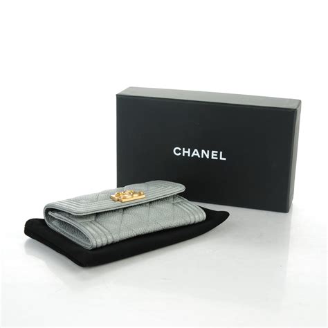 chanel caviar quilted boy card holder|CHANEL .